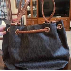 Excellent used condition Michael Kors purse with tassels